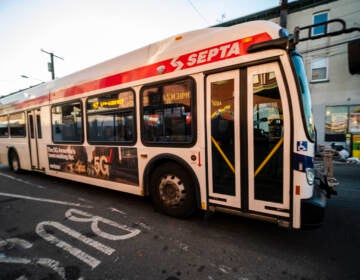 A SEPTA bus travels down a street in Philadelphia