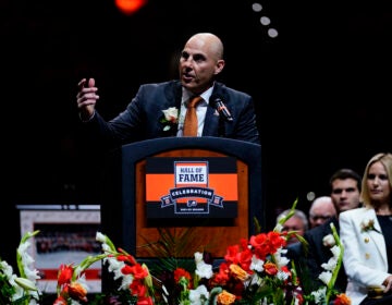 Rick Tocchet speaks during his induction ceremony into the Philadelphia Flyers' Hall of Fame